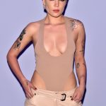 Halsey shows her tits off in a low cut bodysuit