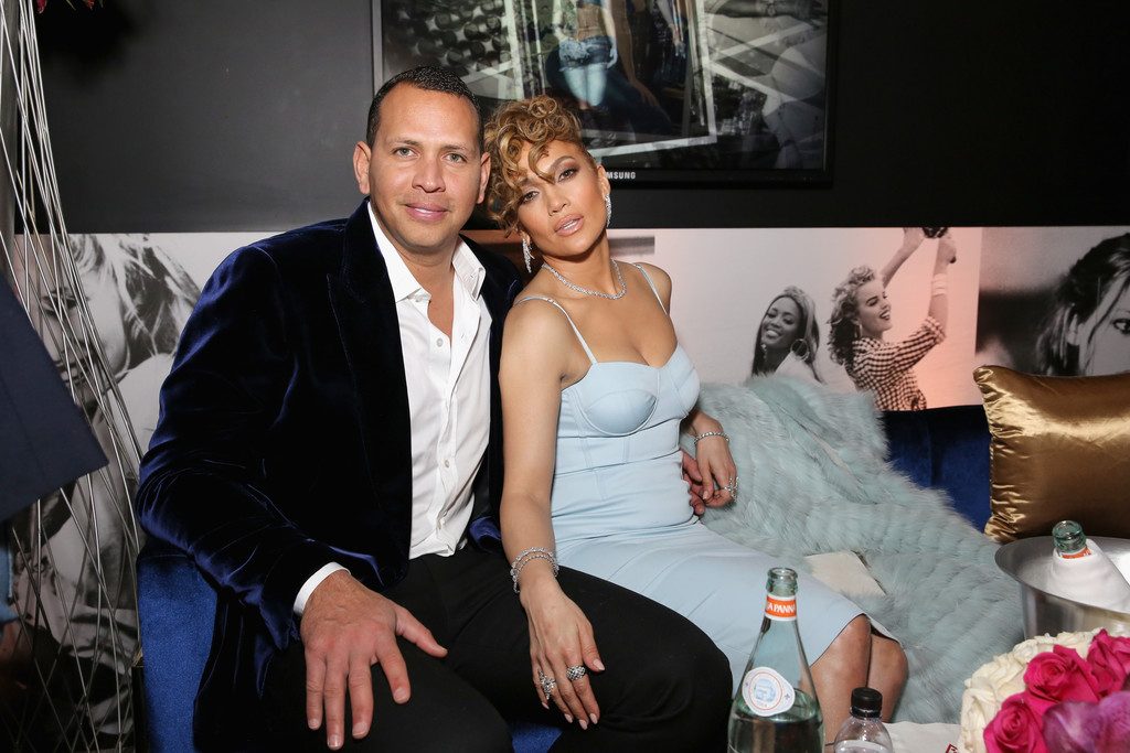 J.Lo in a blue dress showing tits