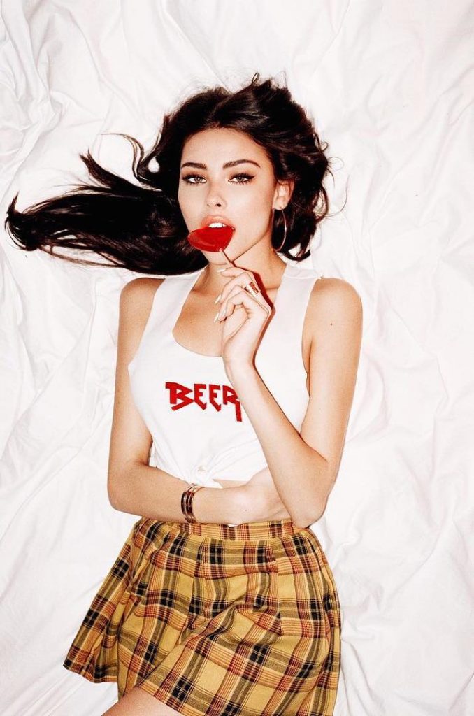 Madison Beer Sucking a Lollypop in a Skirt