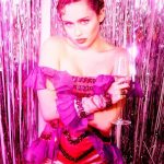 Miley Cyrus cleavage in pink dress
