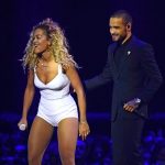 Rita Ora in a white diaper on stage at the Brits
