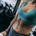 Sarah Hyland blue sports bra tits out