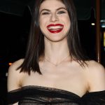 Alexandra Daddario smiles with her tits out in see through black gown