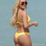 Amber Turner botty in a tight yellow bikini