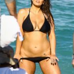 Ashley Graham pulling down her bikini bottoms to show her fat pussy