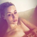 Iggy Azalea naked holding her tits in the bath
