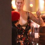 Ireland Baldwin tits out in a dress yellow wasted