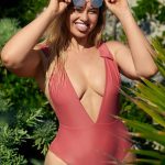 Iskra Lawrence fat girl cleavage in a tight pink swimsuit
