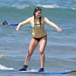 Kira Kosarin tries to surf