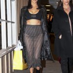 Kourtney Kardashian black panties in a sheer skirt