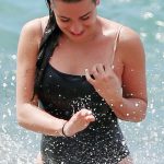 Lea Michele Splashing in a swimsuit