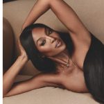 Naomi Campbell topless with her hair as bra 2