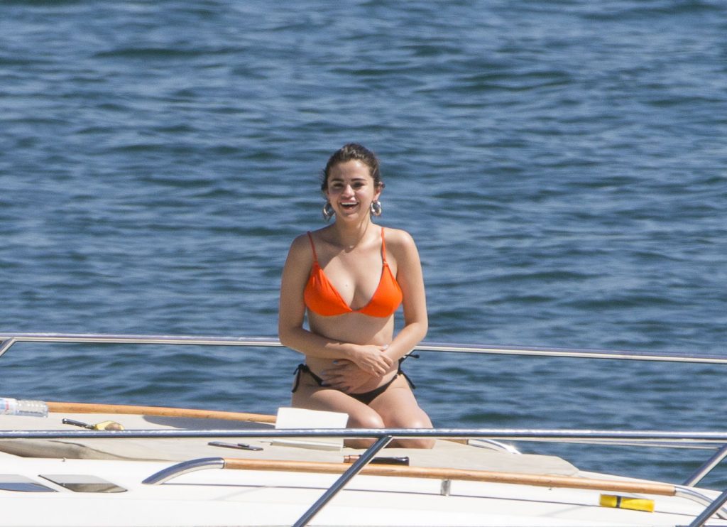 Selena Gomez big tits in a bikini top