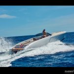 Veronika Klimovits nude driving a boat