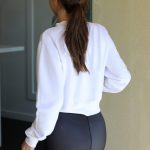 Selena Gomez ass in leggings and white sweater