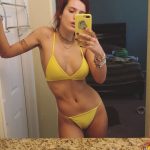 Bella Thorne Tits in Yellow Bikini at Coachella