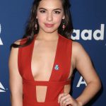 Isabella Gomez Big Tits in a Red Jumpsuit