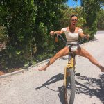 Kourtney Kardashian Spreads her Legs Riding a Bike in Short Shorts