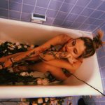 Paris Jackson in Red BRa in a Bathtub Filled with Flowers 2