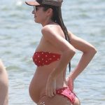 candice swanepoel pregnant in a little red bikini