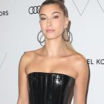 Hailey Baldwin TIts in a Leather Dress at Event