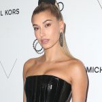 Hailey Baldwin TIts in a Leather Dress at Event