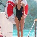 Kendall Jenner Pussy Print in a Black One Piece Swimsuit
