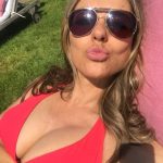 Li Hurley big Tits in a red bikini