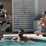Olivia Culpo & Cara Santana in the pool in a black thong bikini 2