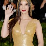 Olivia Munn TIts in a GOld Dress at the MET