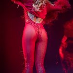 Rita Ora Red Thong Bodysuit on Stage