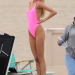 romee strijd tits and ass in a bright pink swimsuit