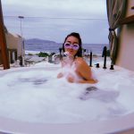 Noah Cyrus Naked in a Hot Tub Covering her Tits