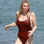 Courtney Love Hard Nipples in a Red Swimsuit Getting Wet