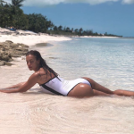 Irina Shayk Booty on the Beach in a White Bikini