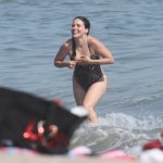 Sophia Bush Tucks Her Titties away as she gets wet in a swimsuit on the beach
