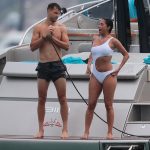 Nicole Scherzinger Gets pressure washed in a white swimsuit