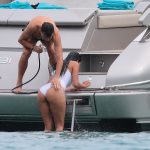 Nicole Scherzinger Gets pressure washed in a white swimsuit