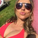Elizabeth Hurley Tits in a Bikini Kissing