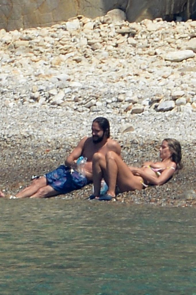 Heidi Klum Topless on a Beach in a Bikini 2