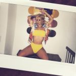 Iggy Azalea fake tits spreading her legs yellow bikini