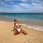 Lais ribeiro spreading her legs in white bikini on beach