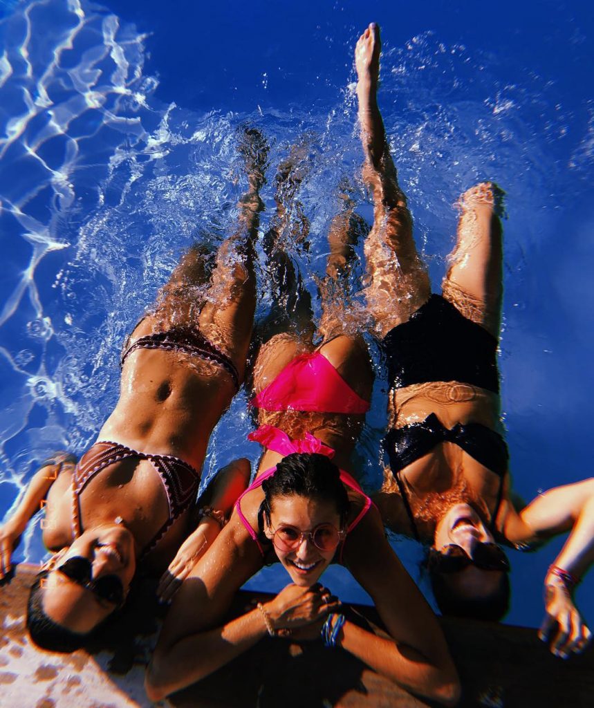Nina Dobrev Ass in Pink Bikini Getting Wet