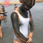eugenie bouchard tits wet white swimsuit covered in mud